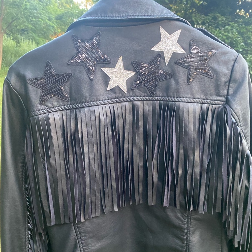 Amazing faux leather jacket - NEVER WORN. A size 2 but it fits like a 4-6.